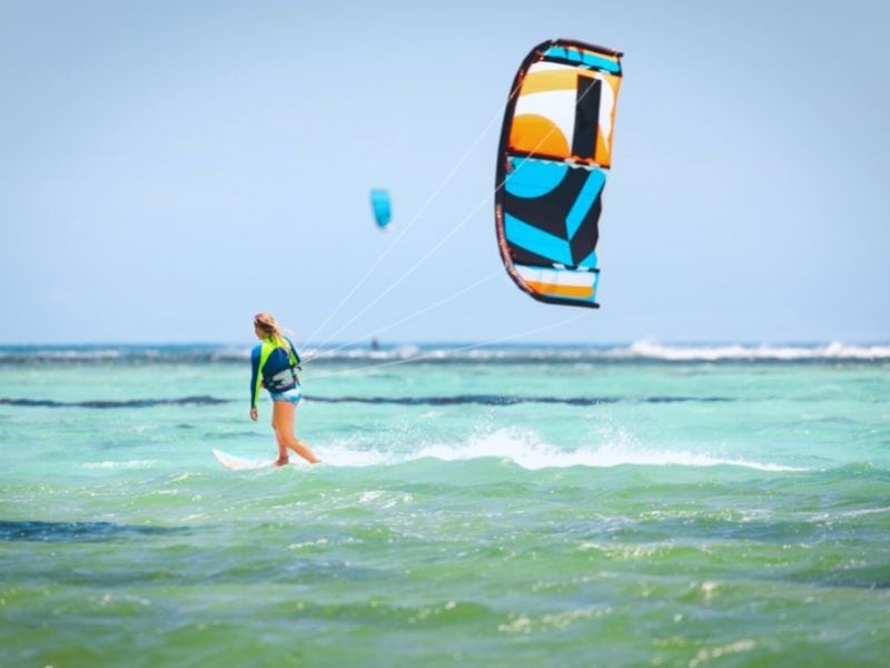 woman kiteboarding in El Cuyo, Mexico, Yucatan Peninsula