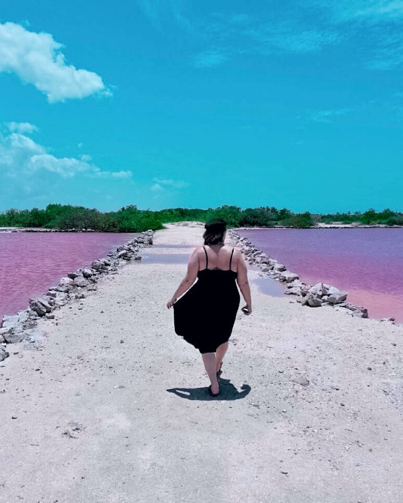 woman at the pink lakes in mexico yucatan
