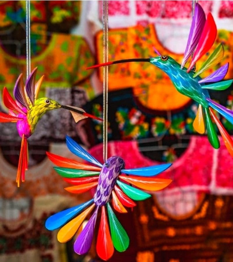 wooden hummingbird figures, pained in bright colors | what to buy in merida souvenirs