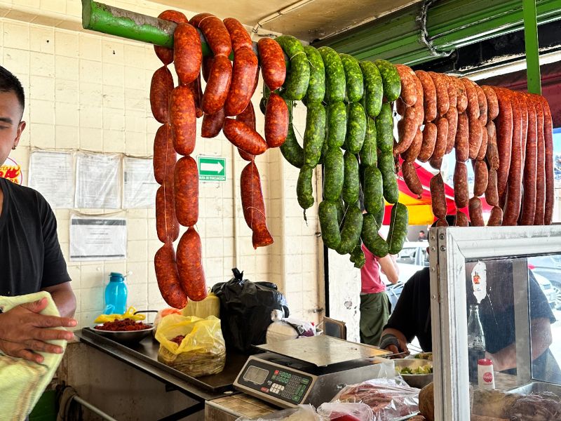 longaniza de valladolid sausage hanging, along with mexican chorizo