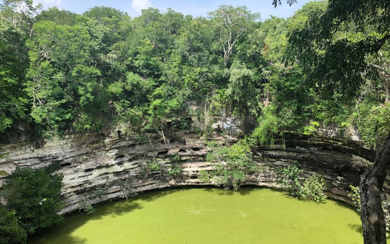 sacred cenote at chichen itza mayan ruins in mexico